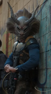 Maska Killmongera, Mgbedike, używana jest przez męskich członków nigeryjskiego ludu Igbo w czasie rytuałów - maski mają w pewien sposób pogorszyć wygląd je zakładających i kontrastować z pięknem żeńskich tancerek