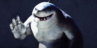 King Shark (głosu postaci użyczył Steve Agee) – humanoidalny rekin znany także jako Nanaue. Pierwotnie pokazano go jako syna boga (lub w innych wersjach króla) rekinów, który dysponuje nadludzką siłą, szybkością, wytrzymałością i w rozmaity sposób wykorzystuje zmysł słuchu. Warto też przypomnieć o natychmiastowej regeneracji jego ciała po zadanym obrażeniu. King Shark ma jedną słabość, która nieustannie warunkuje działania postaci – chodzi tu o nieustanną chęć pożywiania się ludźmi.
