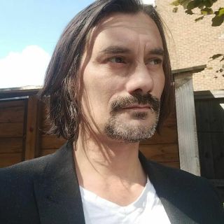 Keanu Reeves - John Wick (John.wix.com)