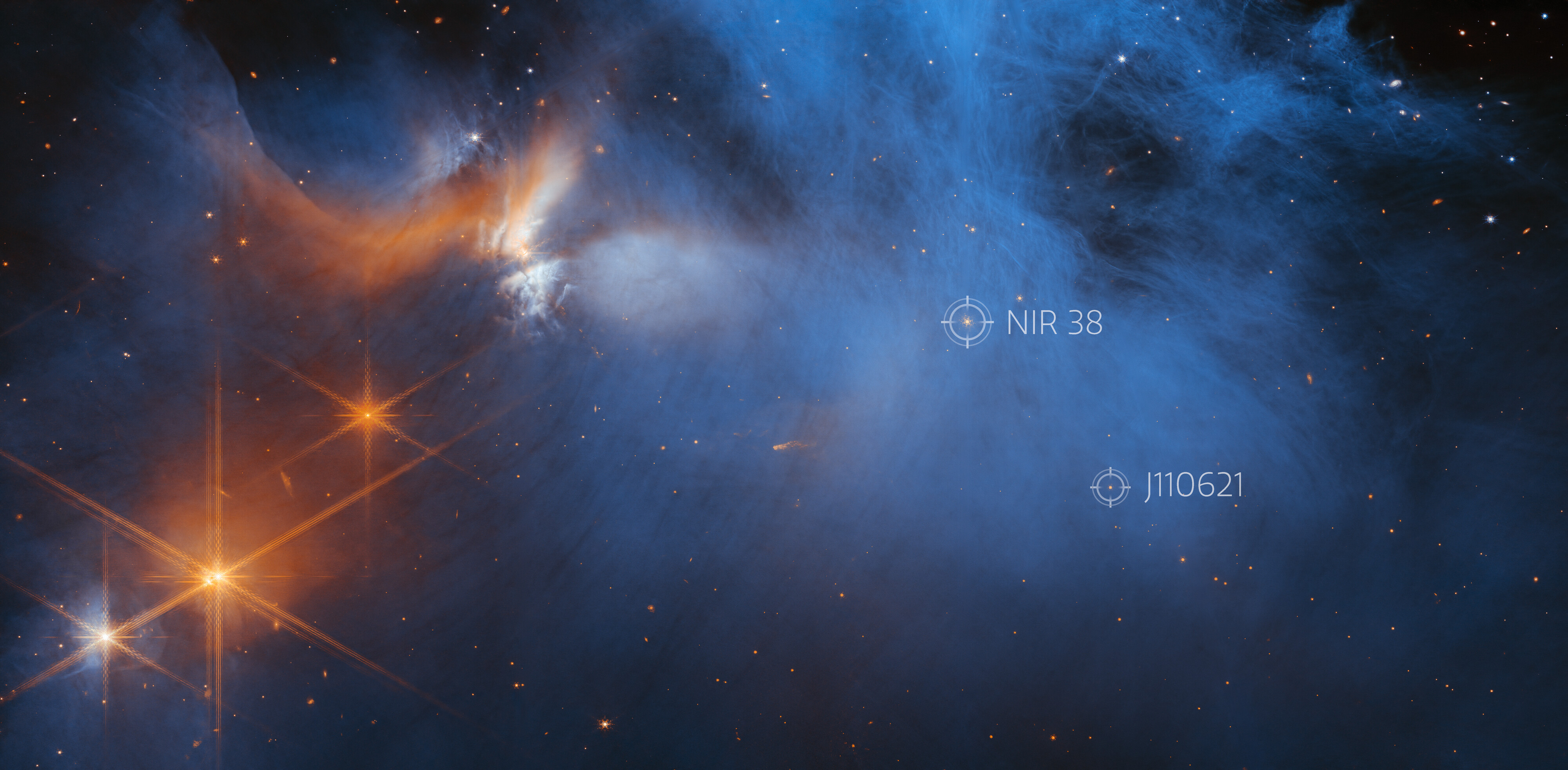 Teleskop Webba - zdjęcie obłoku Kameleon I (położenie gwiazd NIR 38 i J110621)