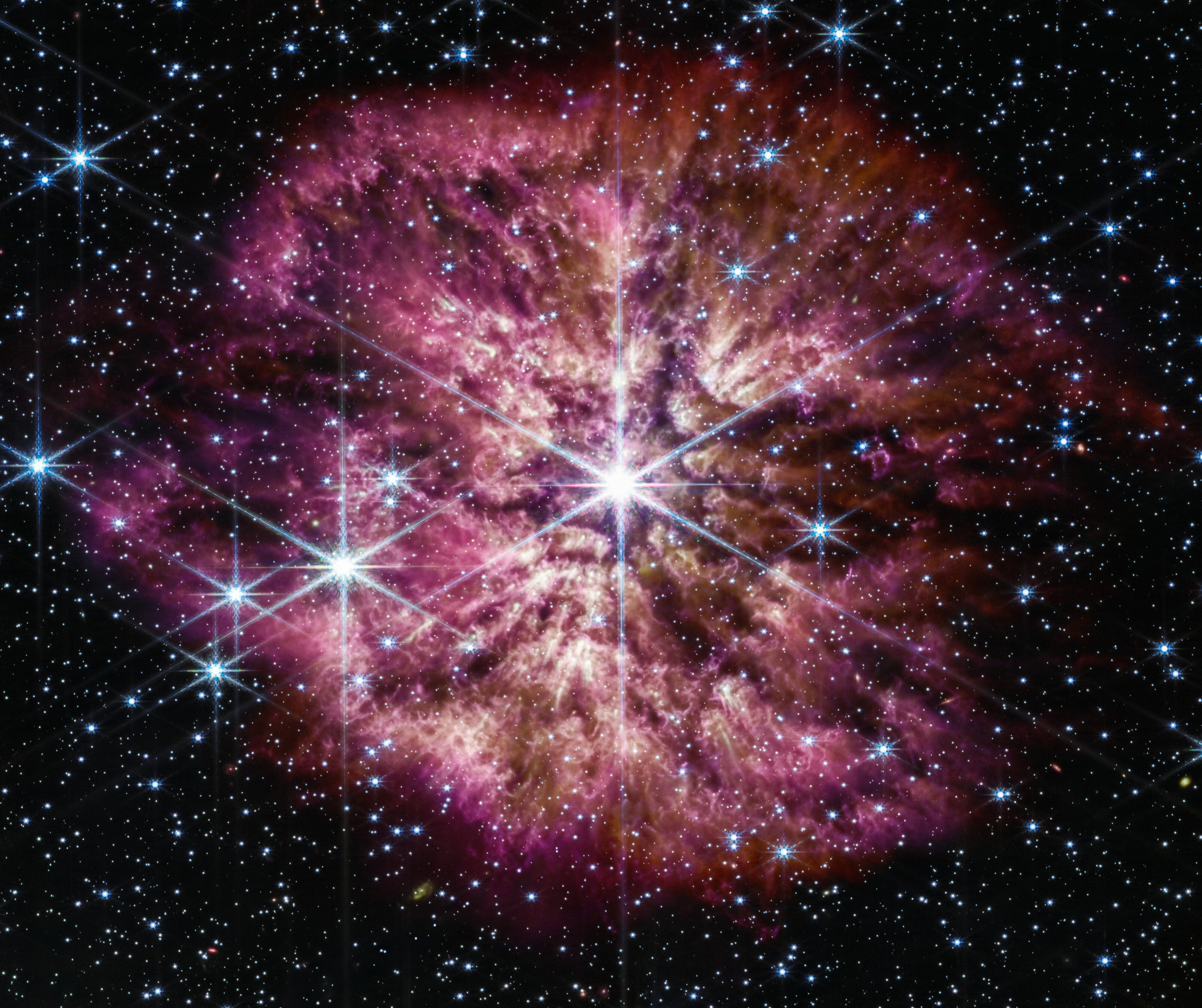 Teleskop Webba - gwiazda WR 124 (nałożone obrazy z kamery NIRCam i instrumentu MIRI)