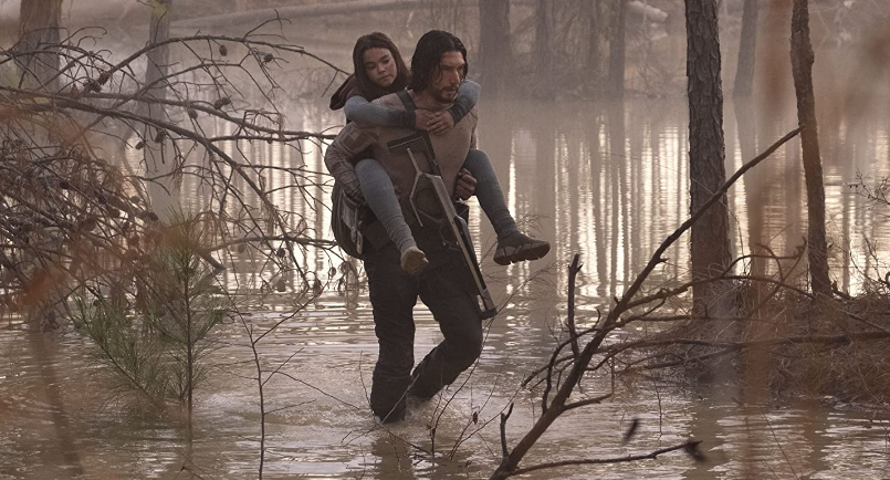     65 - spot filmu z udziałem gwiazdy NBA. Koszykarz ucieka obok Adama Drivera przed dinozaurami