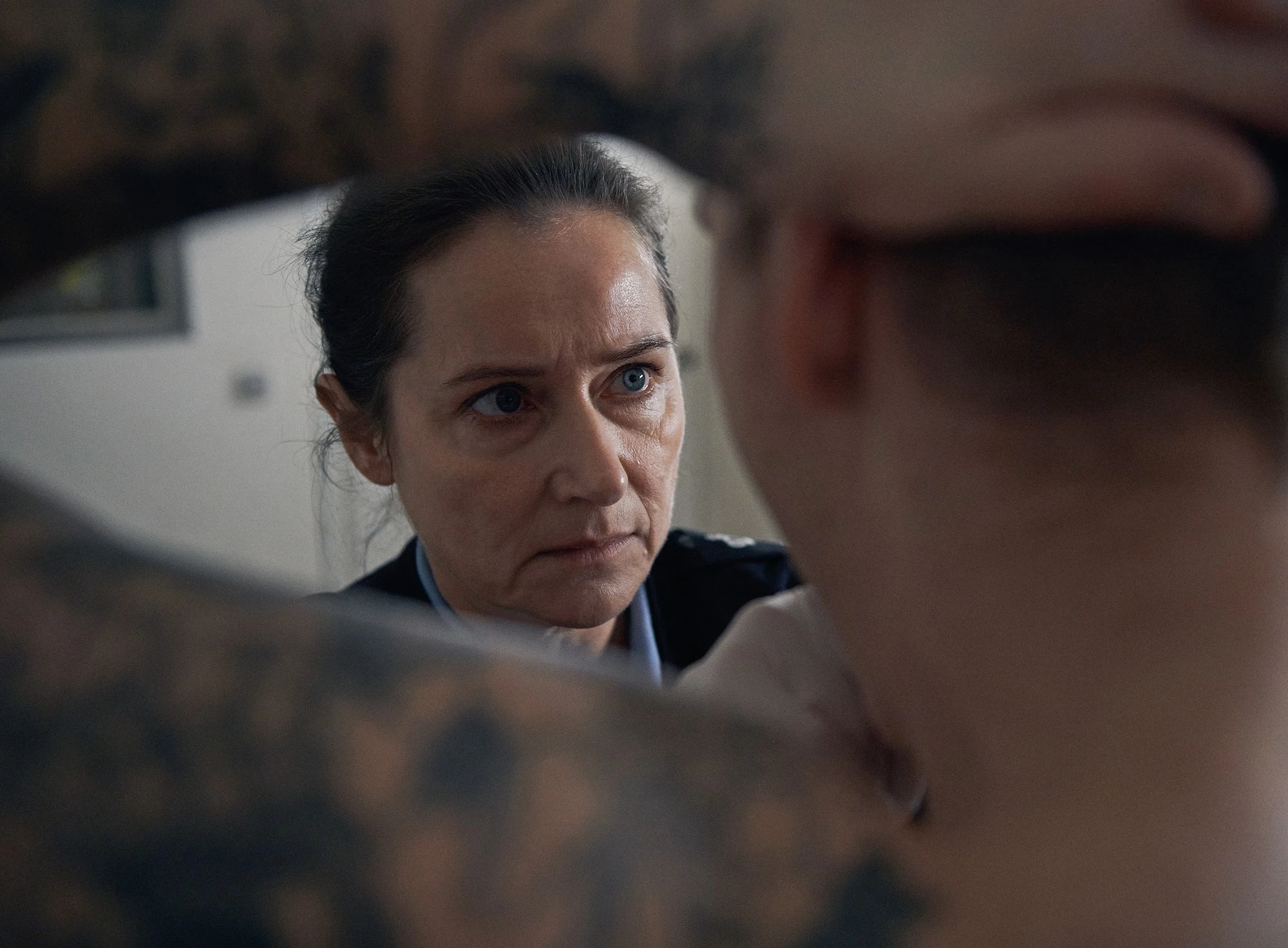 Ukryty motyw - oficjalny kadr z filmu pod tym tytułem, który osadzony jest w fikcyjnym więzieniu.